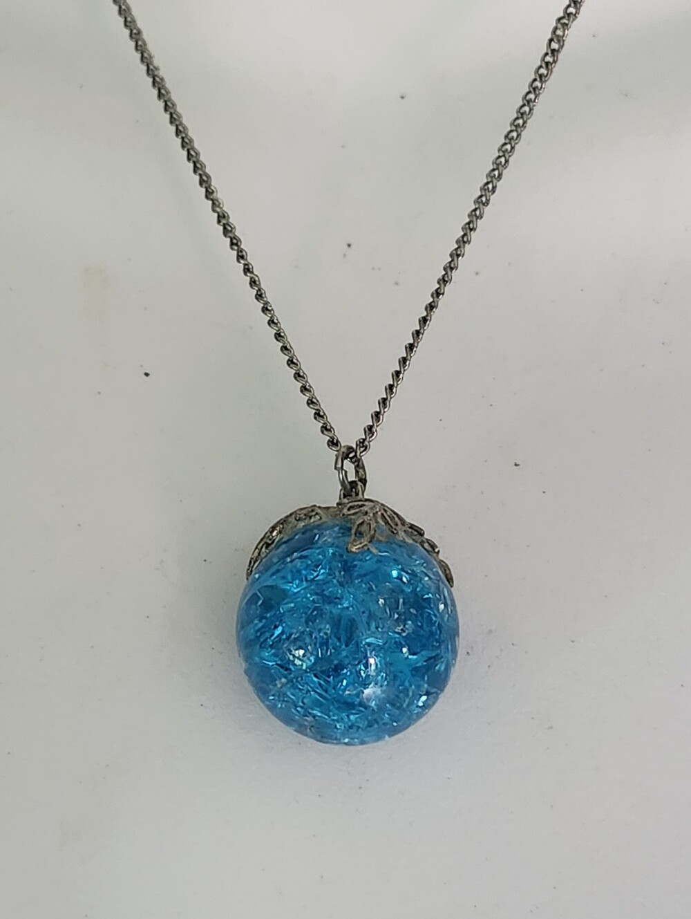 Silver Tone Necklace with Blue Crackle Glass Orb Pendant
